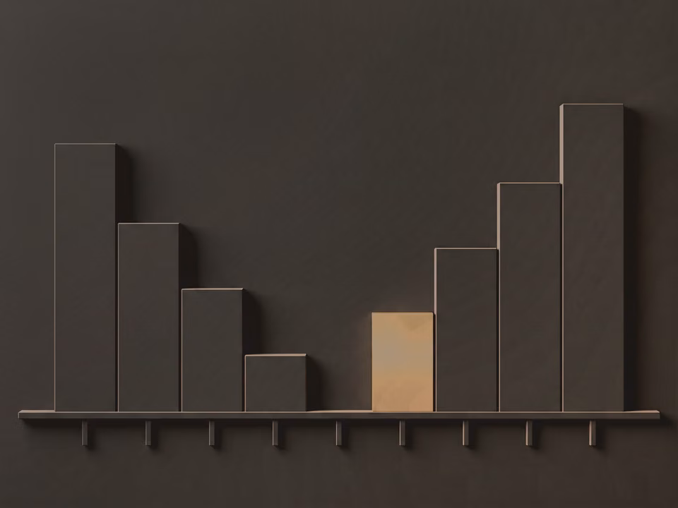 A bar chart cast as shallow relief in dark plaster: four bars stepping down to a stub, a gap, then four stepping up, the first bar of the rising group faced in brass.